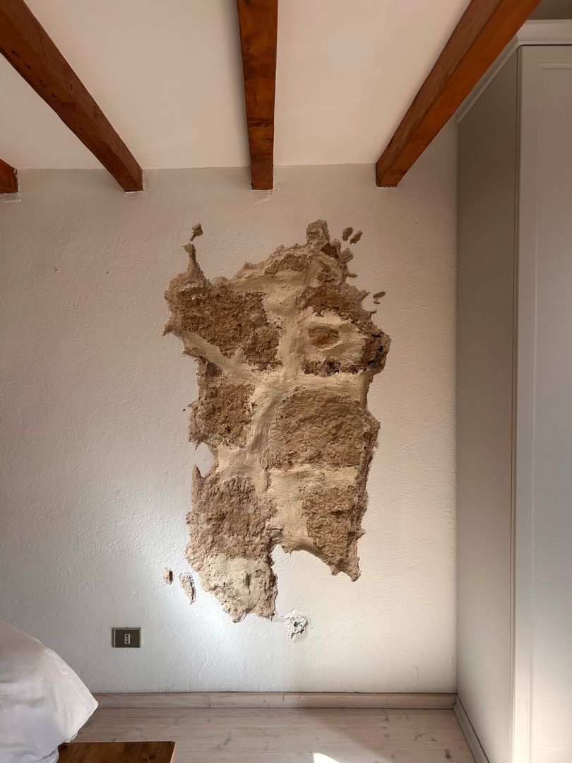 Stone mural in the outline of Sardinia